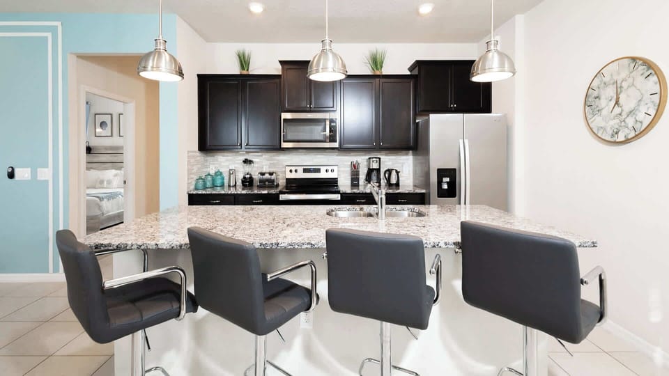 Sip morning coffee or grab a bite at the kitchen counter, with seating for 4