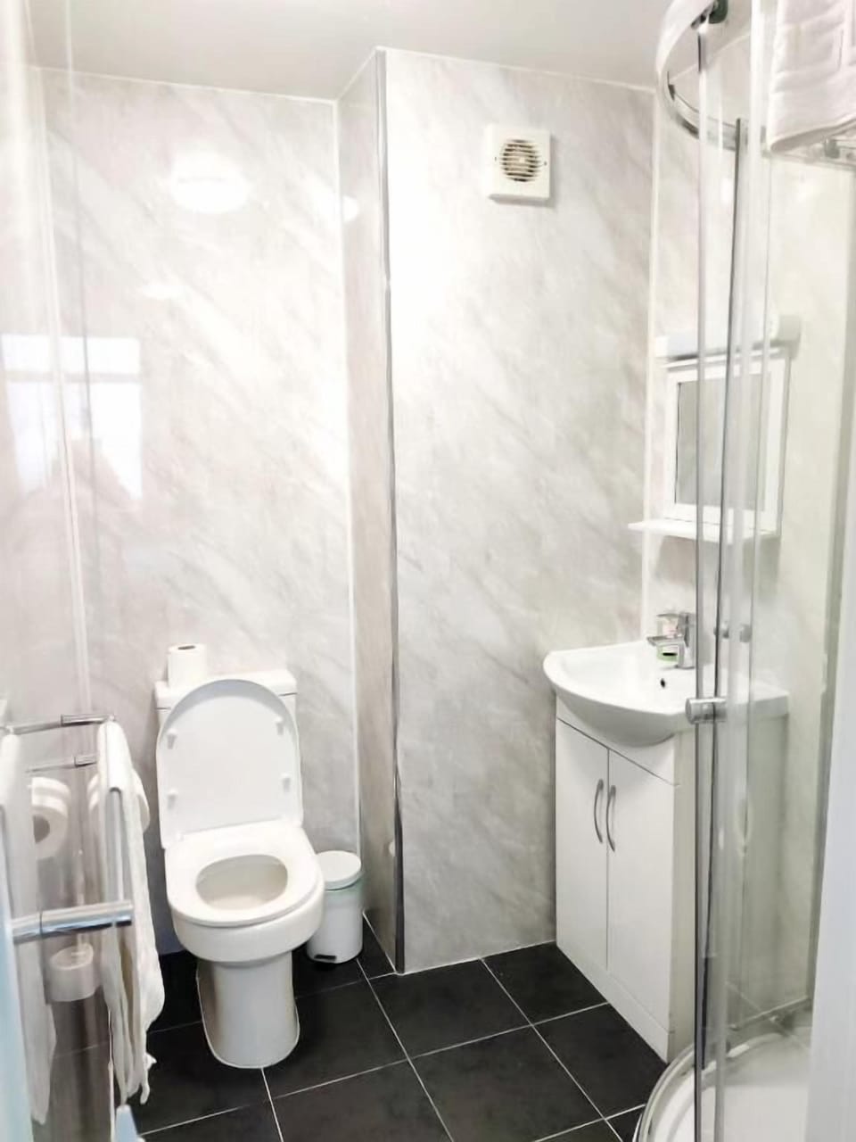 Hair dryer, towels, soap, shampoo