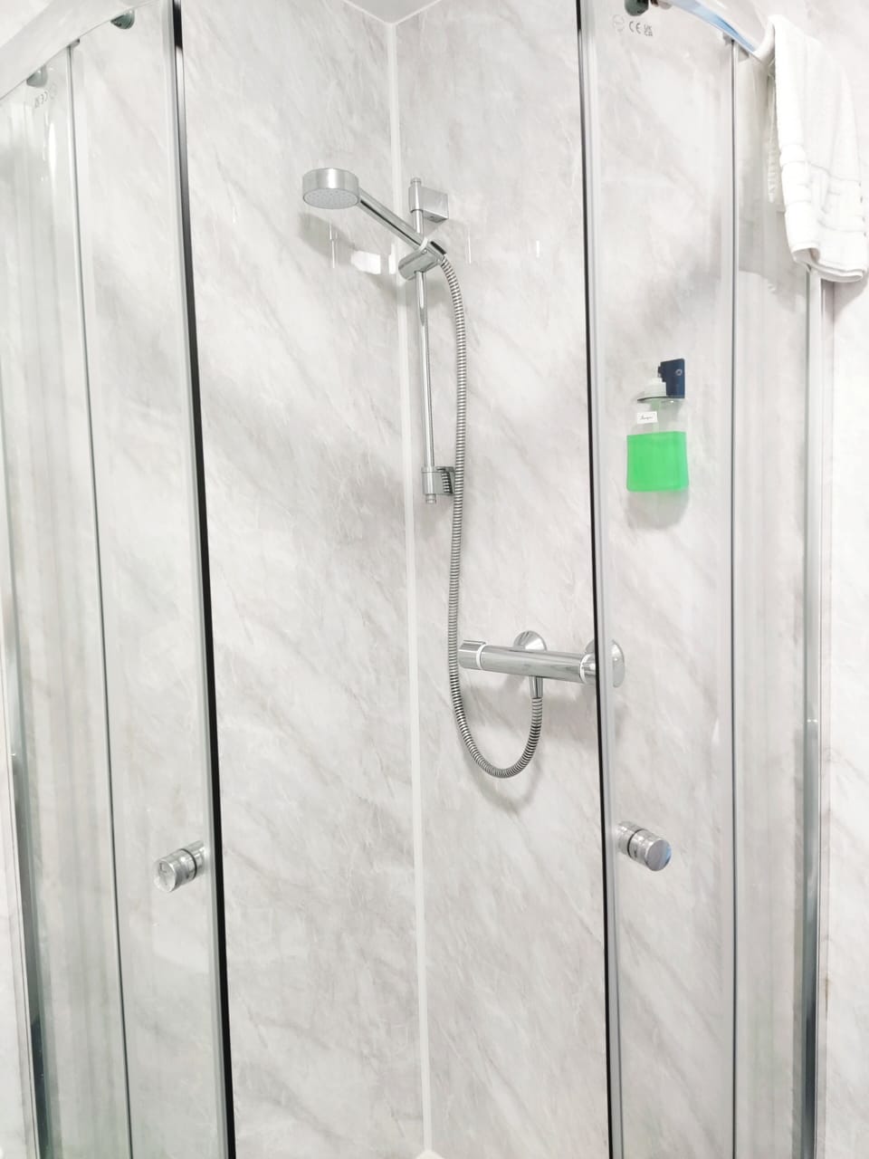 Basic Single Room, Shared Bathroom | Bathroom | Hair dryer, towels, soap, shampoo