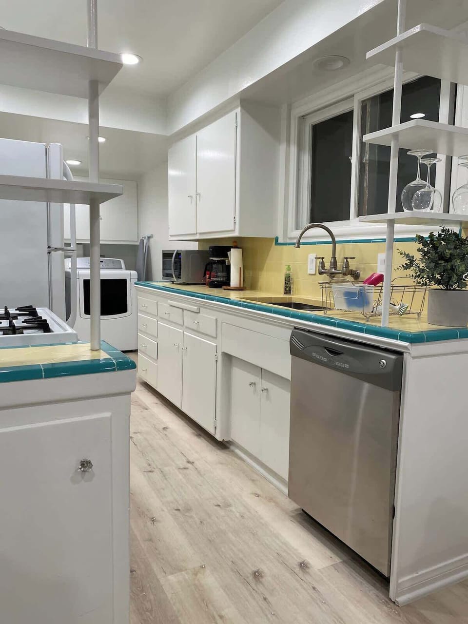 Includes dish washer... garbage disposal...gas range stove... ice box...w/ automatic ice maker...... crock pot...coffee maker...etc