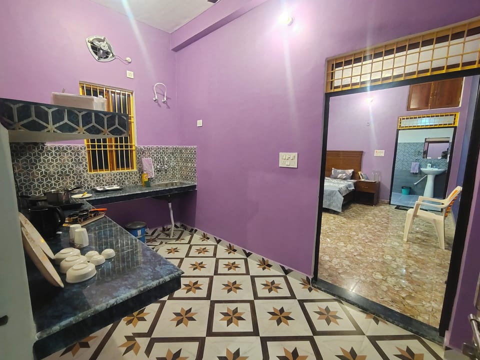 Family Suite, Balcony, City View | Private kitchen | Full-size fridge, microwave, cookware/dishes/utensils