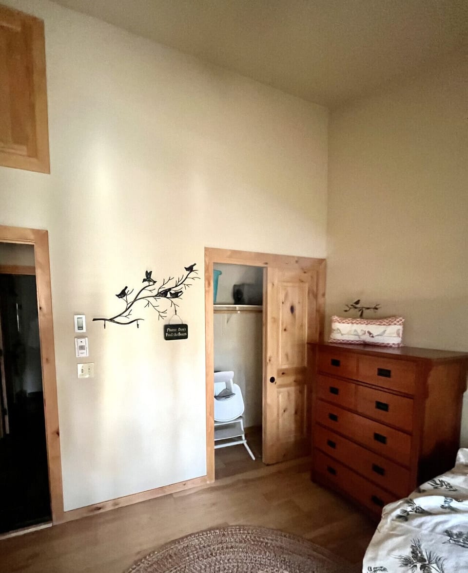 The guest bedroom has plenty of storage space for your things, and a pack & play & high chair in the closet for your smallest guests