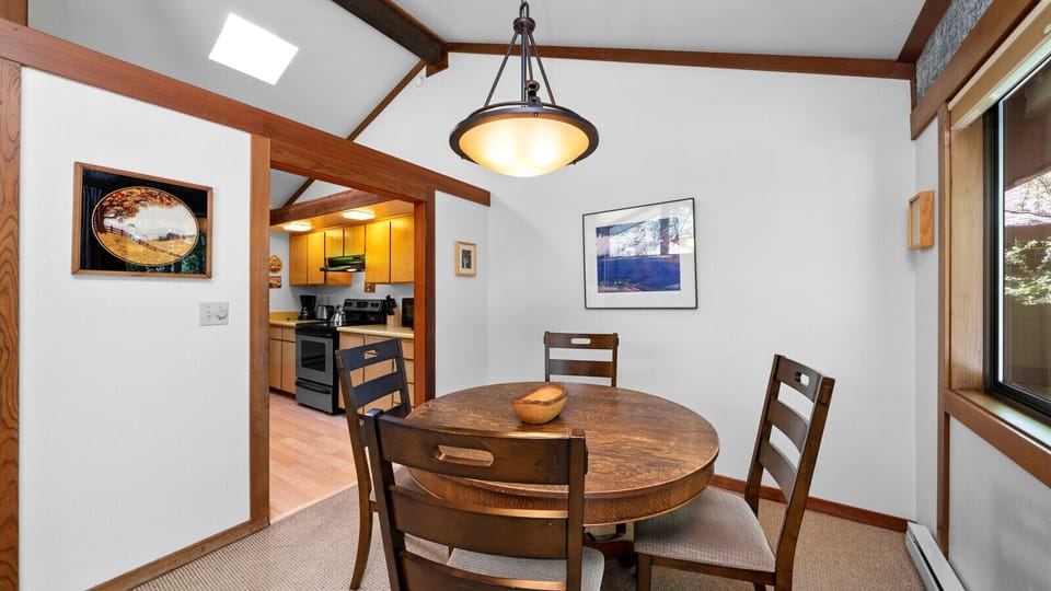 Light and open dining area seats 4