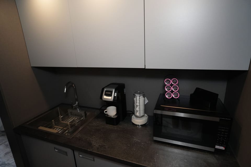 Microwave, coffee/tea maker, cookware/dishes/utensils