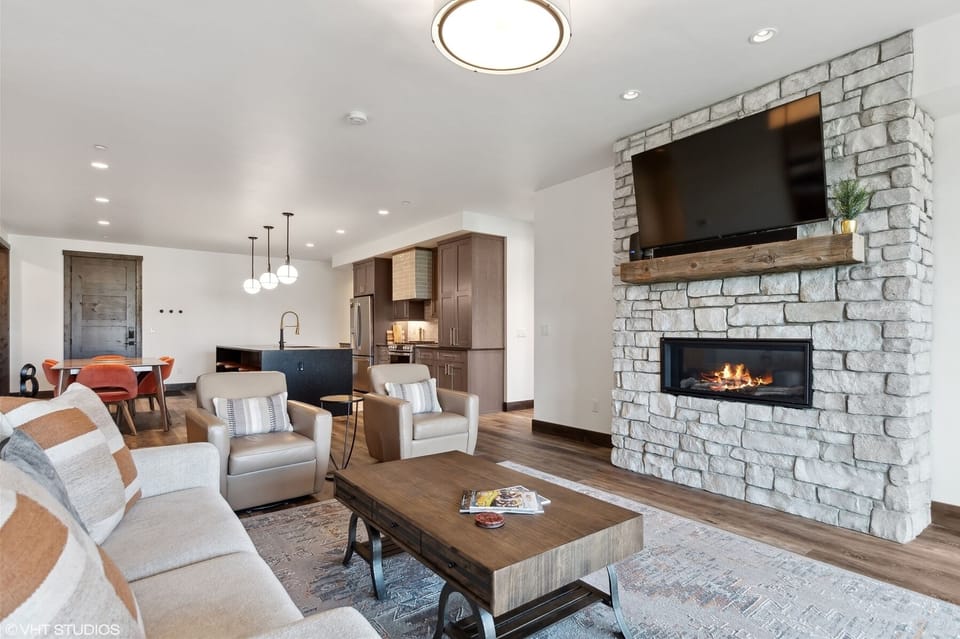 The homes gas fireplace creates a warm, relaxing environment | Main Level