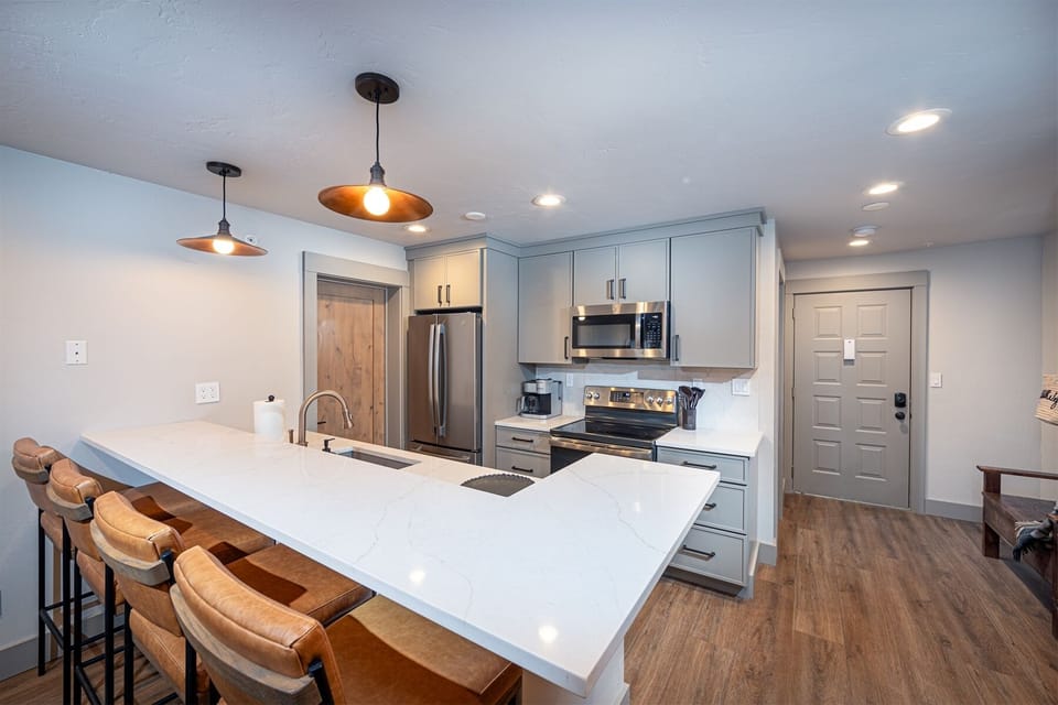 The fully equipped, newly remodeled kitchen has everything you need to prepare a memorable meal | Main Level