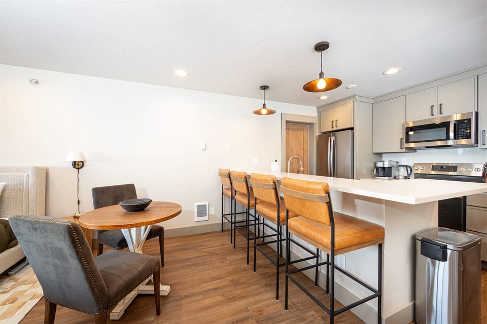 Additional seating is available at the spacious kitchen bar | Main Level