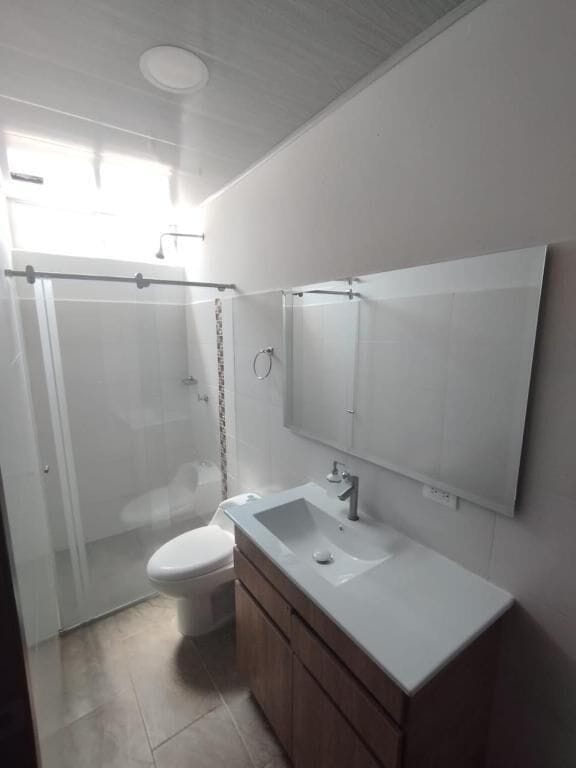 Shower, towels, soap, toilet paper
