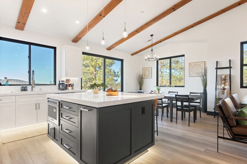 Open kitchen layout with functional island and dining integration.