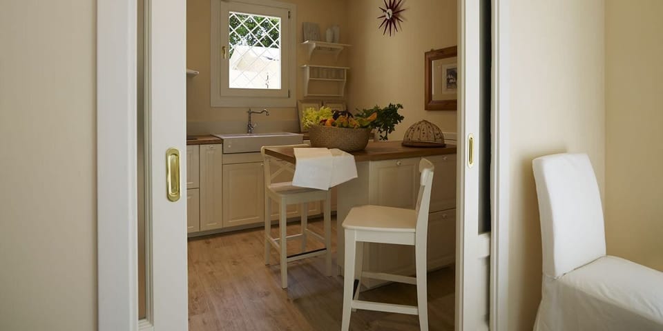 Villa | Private kitchen | Fridge, microwave, oven, stovetop