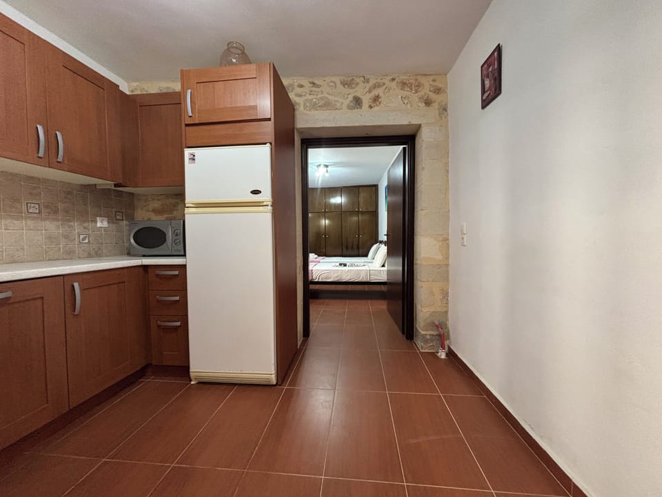 Suite, Pool View | Private kitchen | Full-size fridge, microwave, oven, stovetop