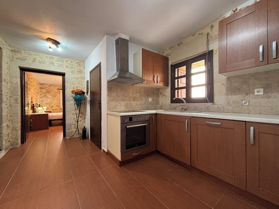 Suite, Pool View | Private kitchen | Full-size fridge, microwave, oven, stovetop
