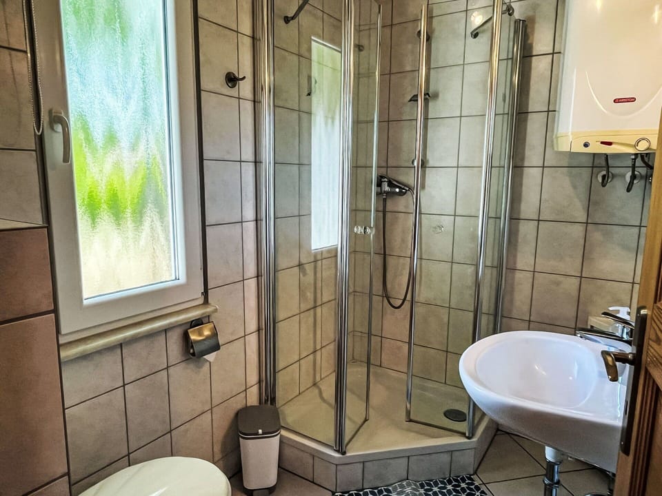 Interior Design, Flooring, Plumbing Fixture, Floor, Room, Bathroom, Plumbing, Bathroom Sink, Shower, Sink