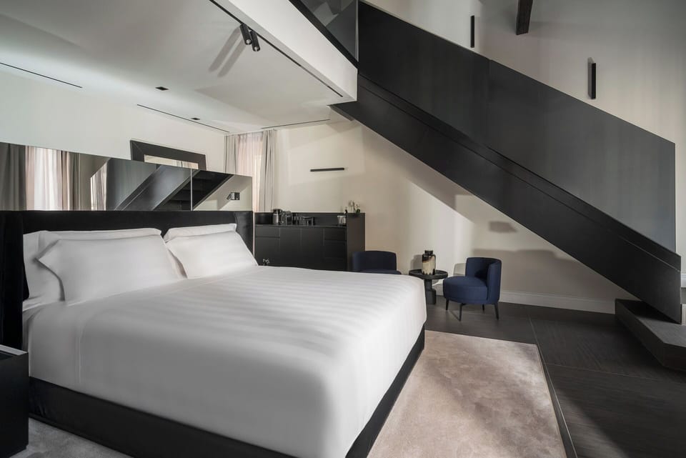 Premium bedding, down comforters, memory foam beds, minibar
