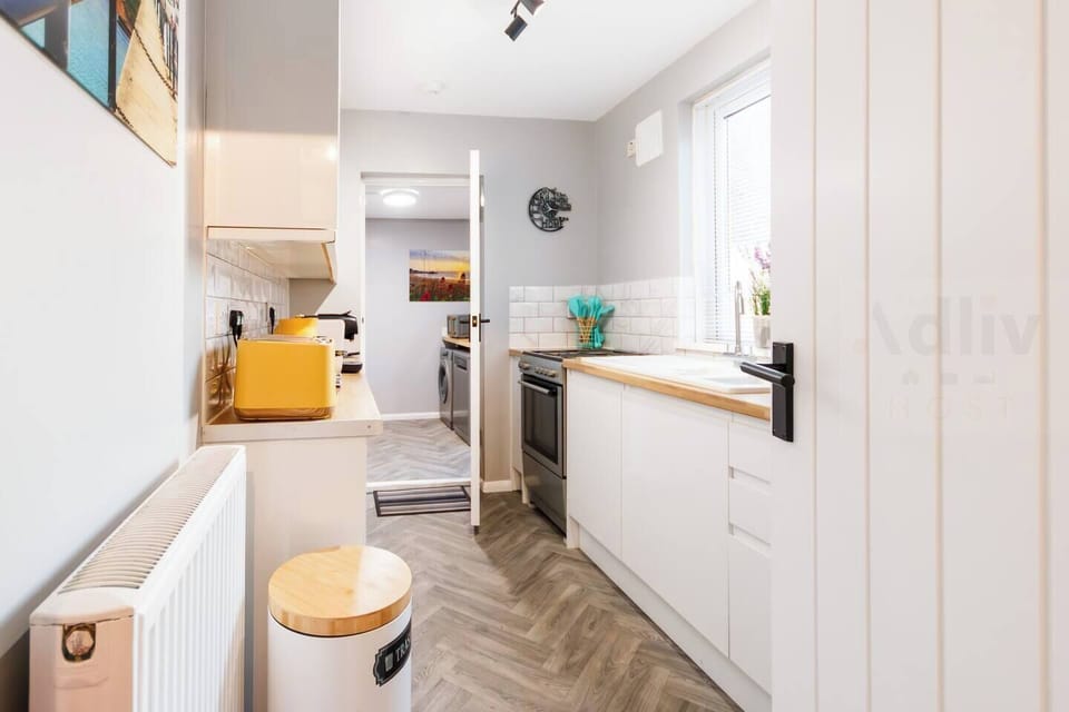 Bright and functional kitchen space, perfect for preparing your favorite meals during your stay.