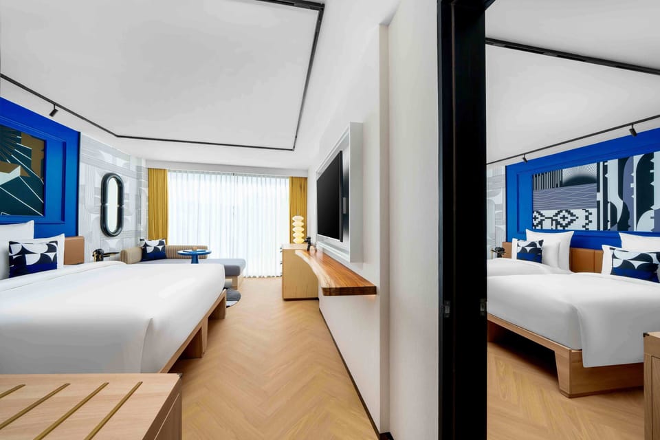 TRIBE Extra King | Minibar, in-room safe, laptop workspace, blackout drapes