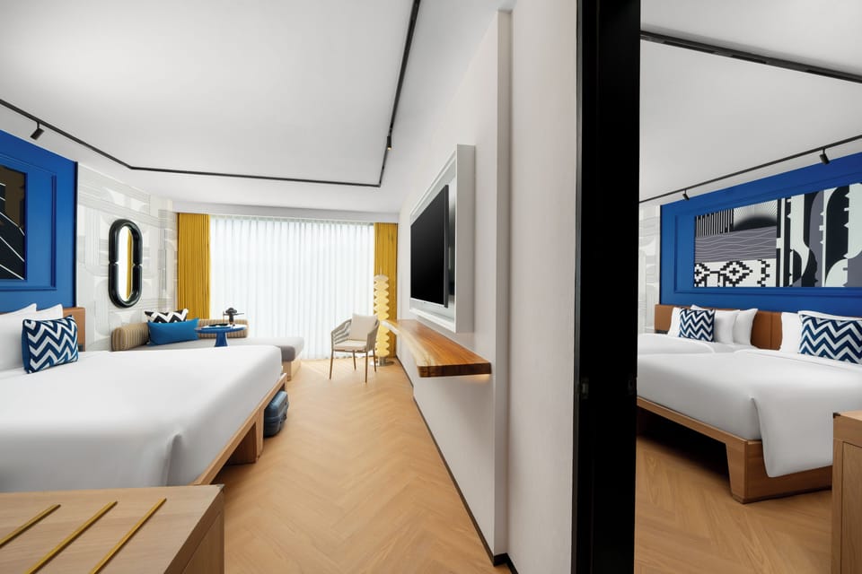 TRIBE Extra King | Minibar, in-room safe, laptop workspace, blackout drapes