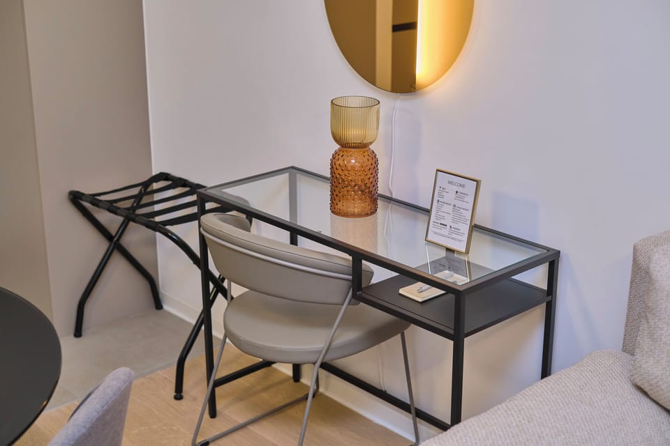Deluxe Condo, Park View | Living area | Flat-screen TV