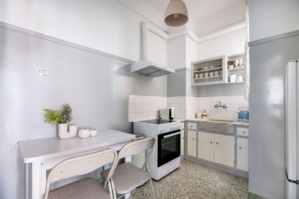Deluxe Apartment, Balcony, City View | Private kitchen | Full-size fridge, oven, stovetop, espresso maker