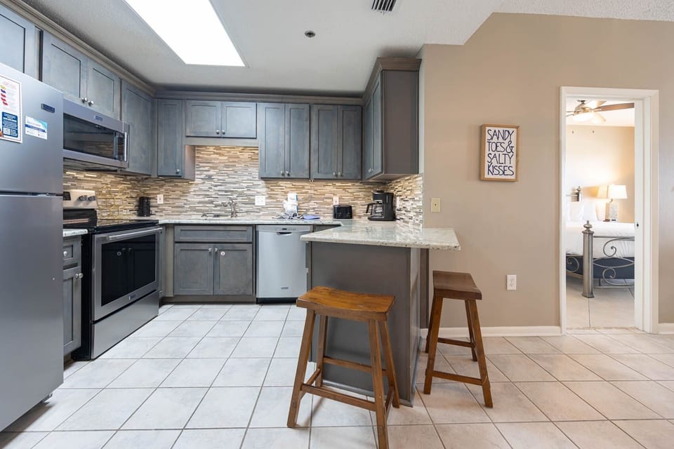 Condo, 2 Bedrooms | Private kitchen | Coffee/tea maker, fridge, oven