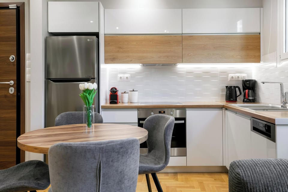 Apartment, City View | Private kitchen | Full-size fridge, oven, dishwasher, espresso maker