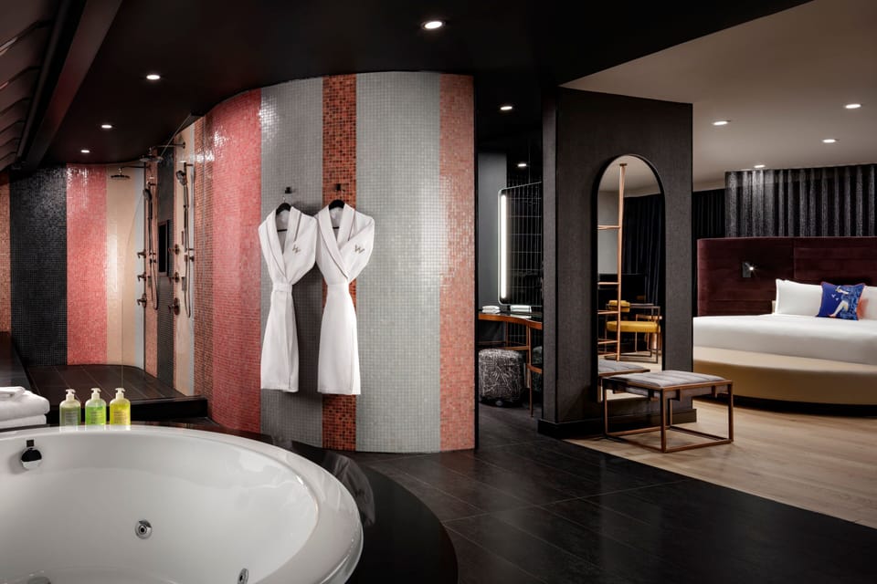 Suite, 1 Bedroom, City View | Bathroom | Shower, designer toiletries, hair dryer, bathrobes