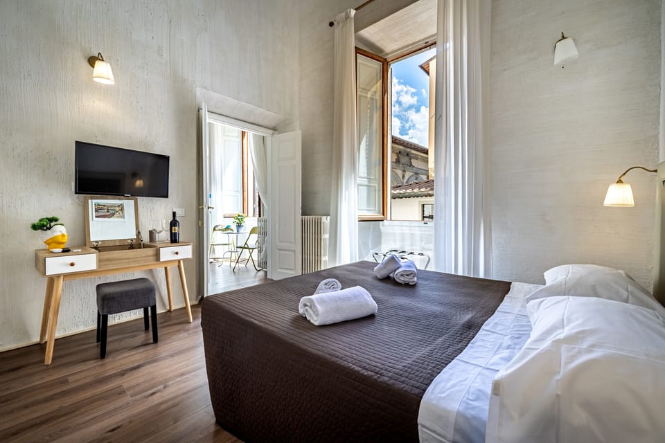 Family Suite, City View (Milano) | Blackout drapes, iron/ironing board, free WiFi
