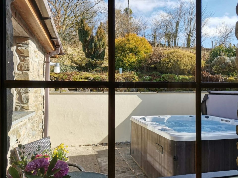 Looking through the window to the bubbling hot tub