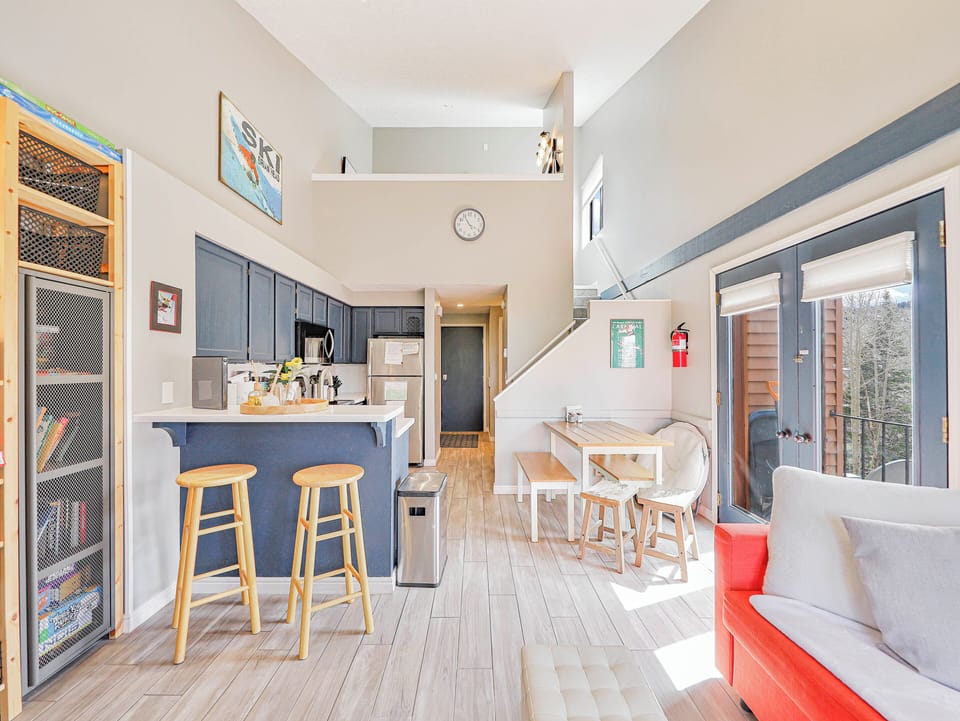 View from the living room to the open concept layout of Timberbrook Corner Loft