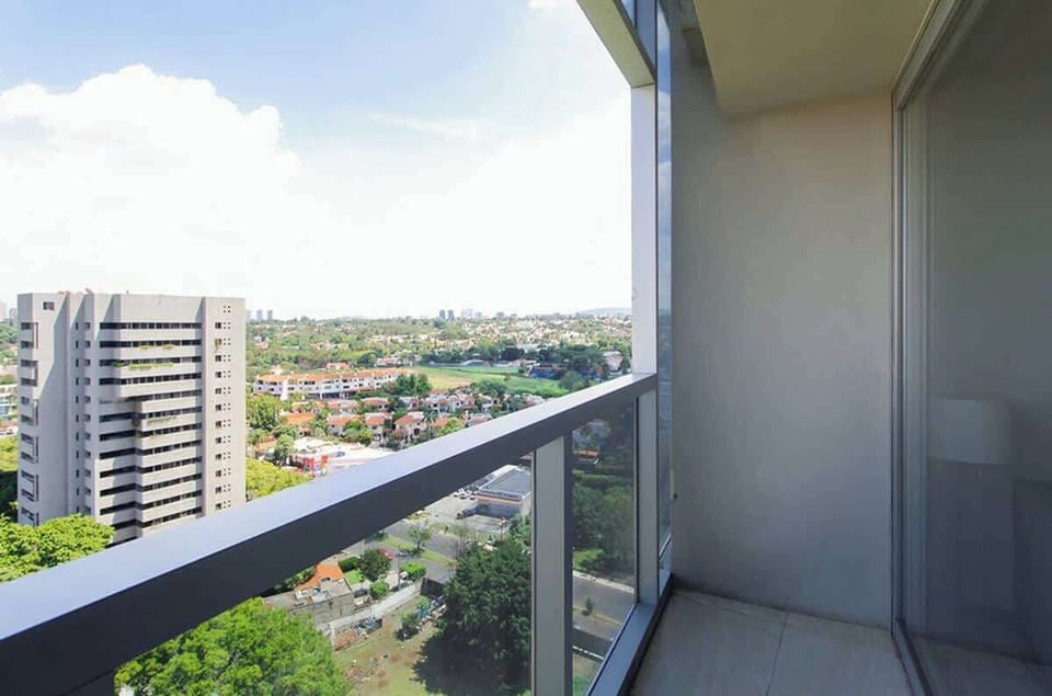 Balcony vantage point w/ open city views & fresh air above the skyline
