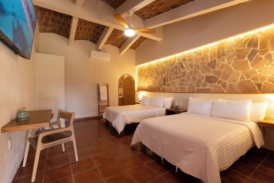 Family Double Room, 2 Double Beds, Garden View | In-room safe, laptop workspace, WiFi (free), bed sheets