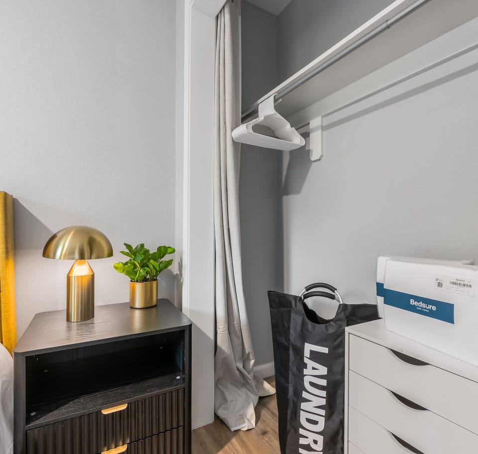 Laundry basket, storage and hanger spaces