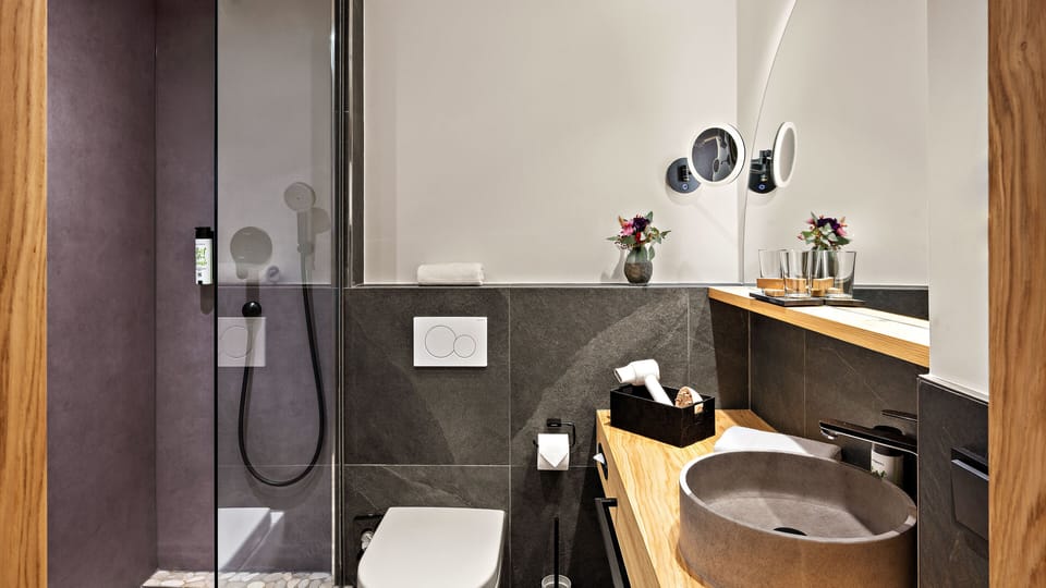 Comfort Double Room Alpenchic | Bathroom | Shower, rainfall showerhead, free toiletries, hair dryer