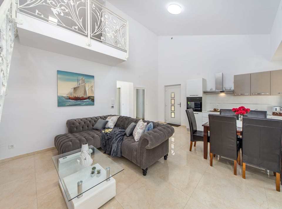 Villa (Three Bedroom House with Pool) | Living room | 32-inch flat-screen TV with cable channels