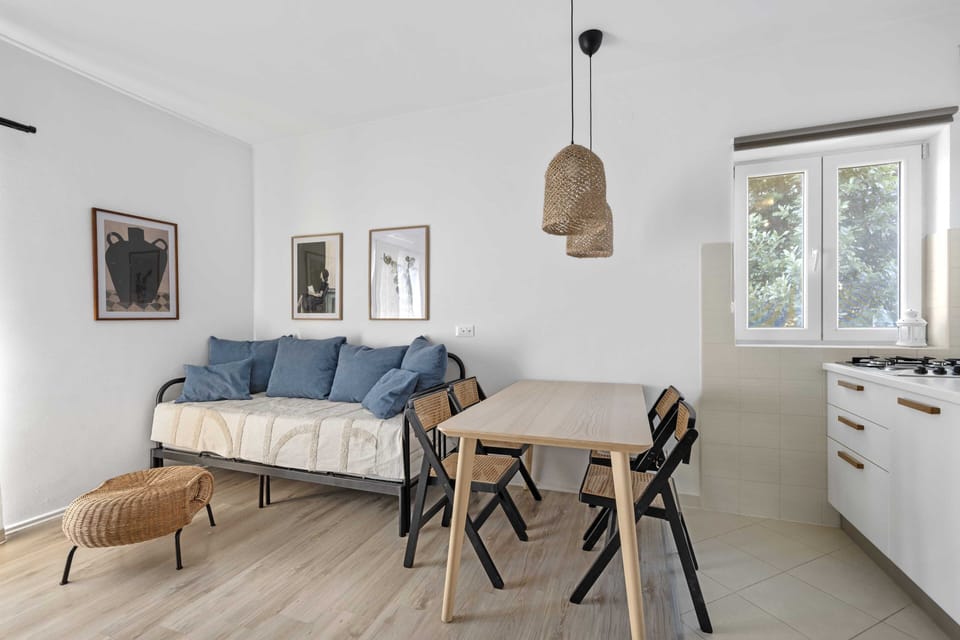 Apartment (One-Bedroom Apartment With Pool) | Living room | 32-inch flat-screen TV with cable channels