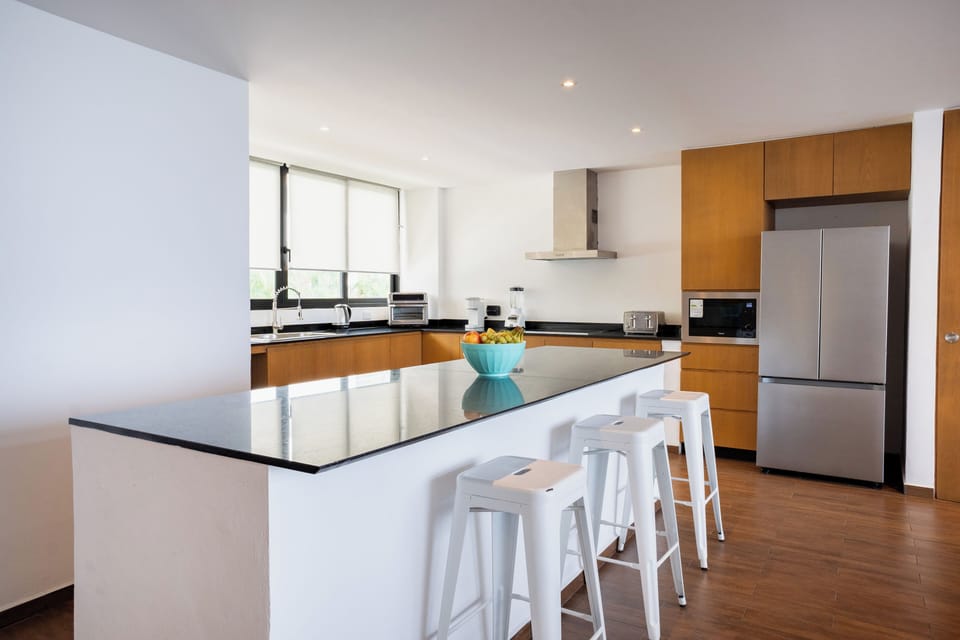 Family Apartment, Balcony, Garden View | Private kitchen | Coffee/tea maker