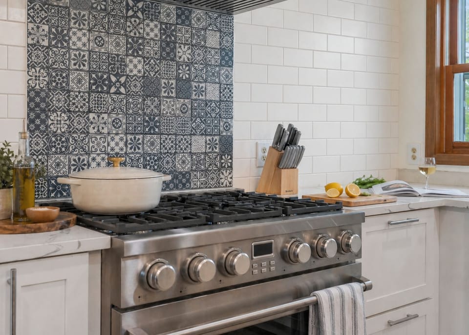 Beautifully appointed kitchen with range and statement tile backsplash