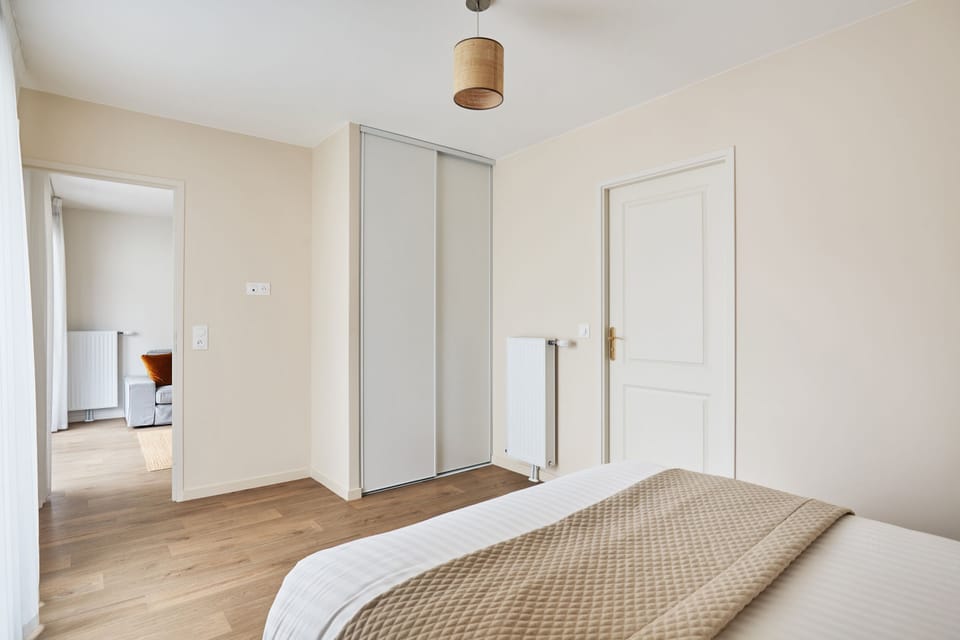 View from bedroom to hallway, showcasing smooth transitions and thoughtful, accessible layout.