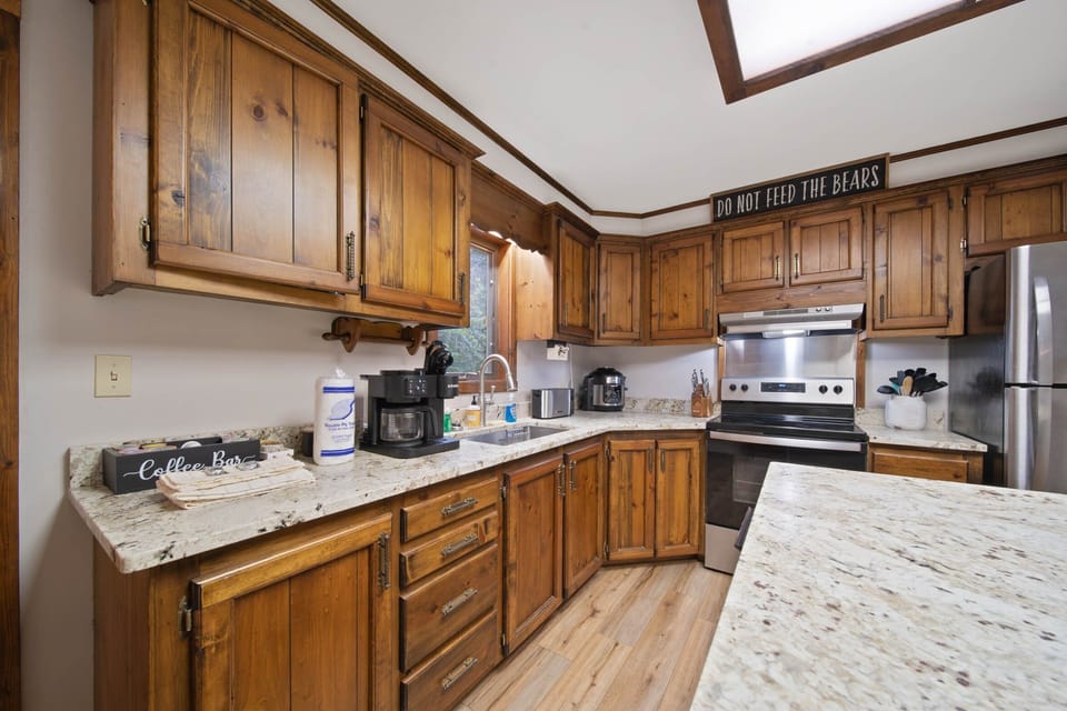 Well Stocked Kitchen with Granite Counters