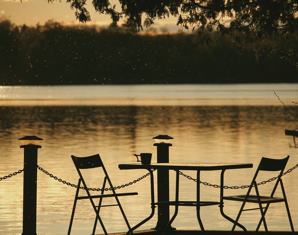 Sitting arrangement by the lake. Enjoy your morning coffee with a view