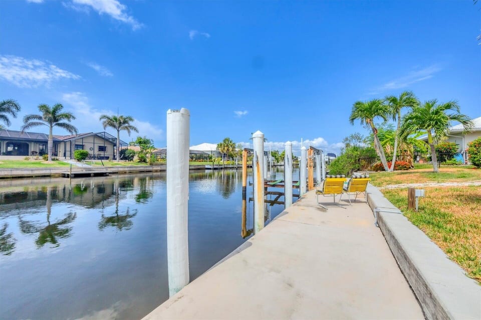 Boat parking on large 6'x55' Dock (Power and Water) with Access to the canal and Gulf!