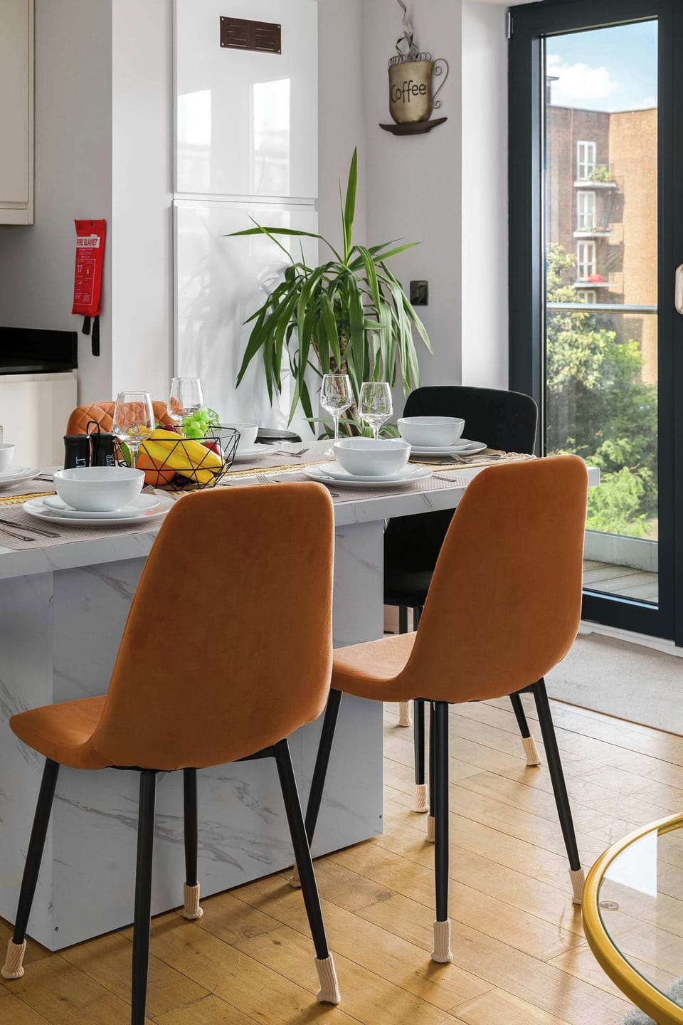 Gather around the stylish dining table—the perfect place to enjoy home-cooked meals, morning coffee and memorable moments together