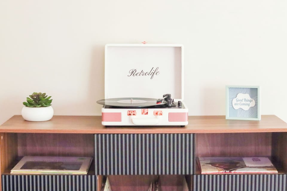 Set the mood with vinyl vibes on our classic record player!