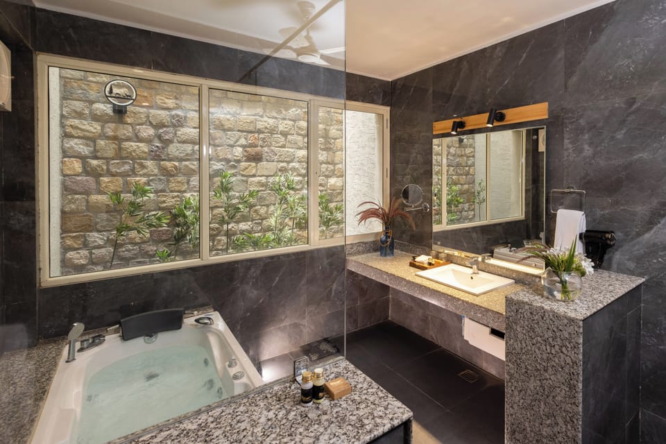 Senior Villa, Resort View | Bathroom | Shower, slippers, towels, soap