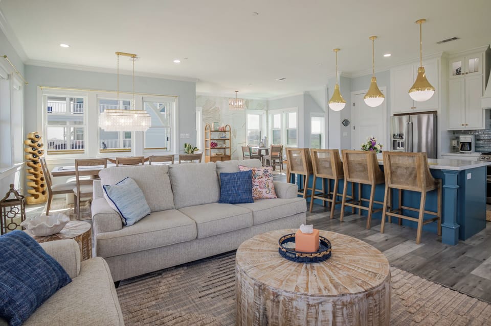 Living room featured a plush sectional and a huge TV - perfect for movie nights.