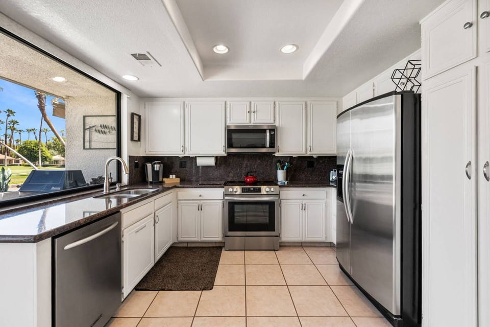 Open Kitchen With Stainless Steel Appliances