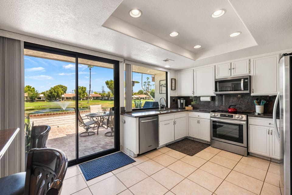 Kitchen With a View Of Rancho Las Palmas Golf Course