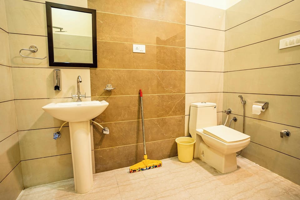 Bed in 12 Bed Mixed AC Dormitory Room with Ensuite Bathroom | Bathroom | Shower, toilet paper
