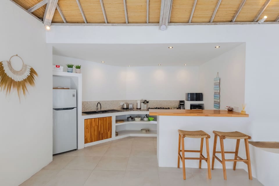 Family Villa, Garden View | Private kitchen | Fridge, microwave, stovetop, electric kettle