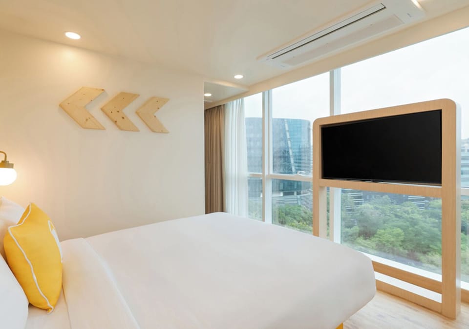 Double Room, City View | Iron/ironing board, free WiFi